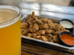 Beer and snacks at one of the best happy hours in Austin.