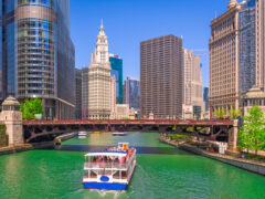 Boat sailing the Chicago River, one of the best outdoor activities in Chicago, Illinois.
