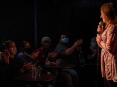 Comedian onstage at one of the best comedy clubs in Chicago, the Lincoln Lodge.