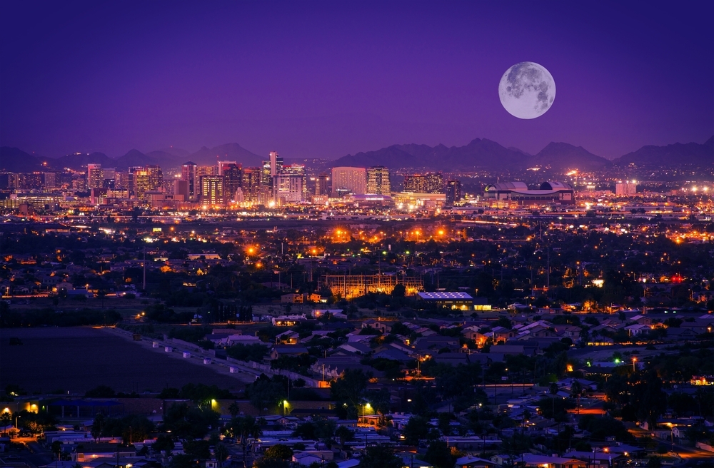 A full moon over Phoenix, Arizona, at night.