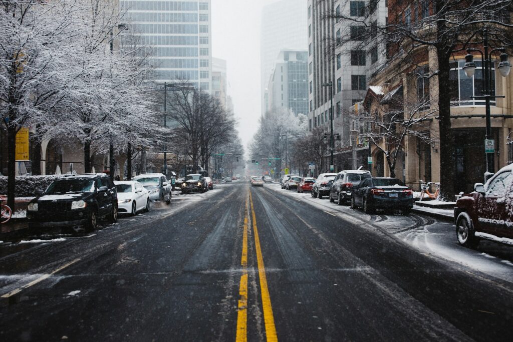A snowy street in a centric city in North Carolina