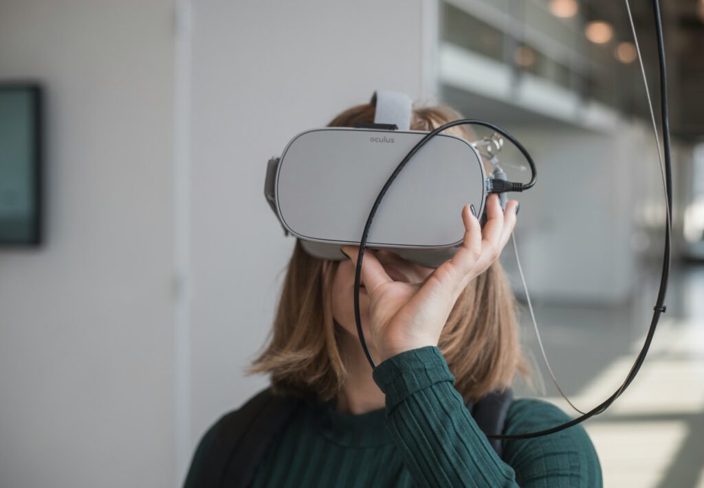 Woman using VR Oculus glasses
